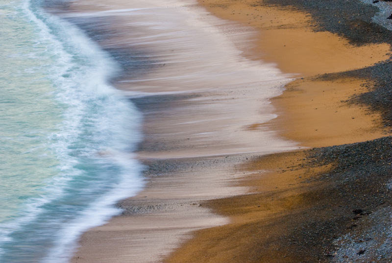 Waves Breaking On Sand